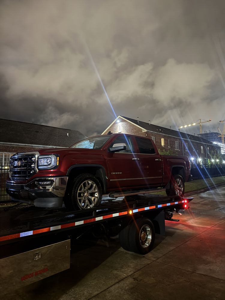 Professional tow truck service in Memphis at night